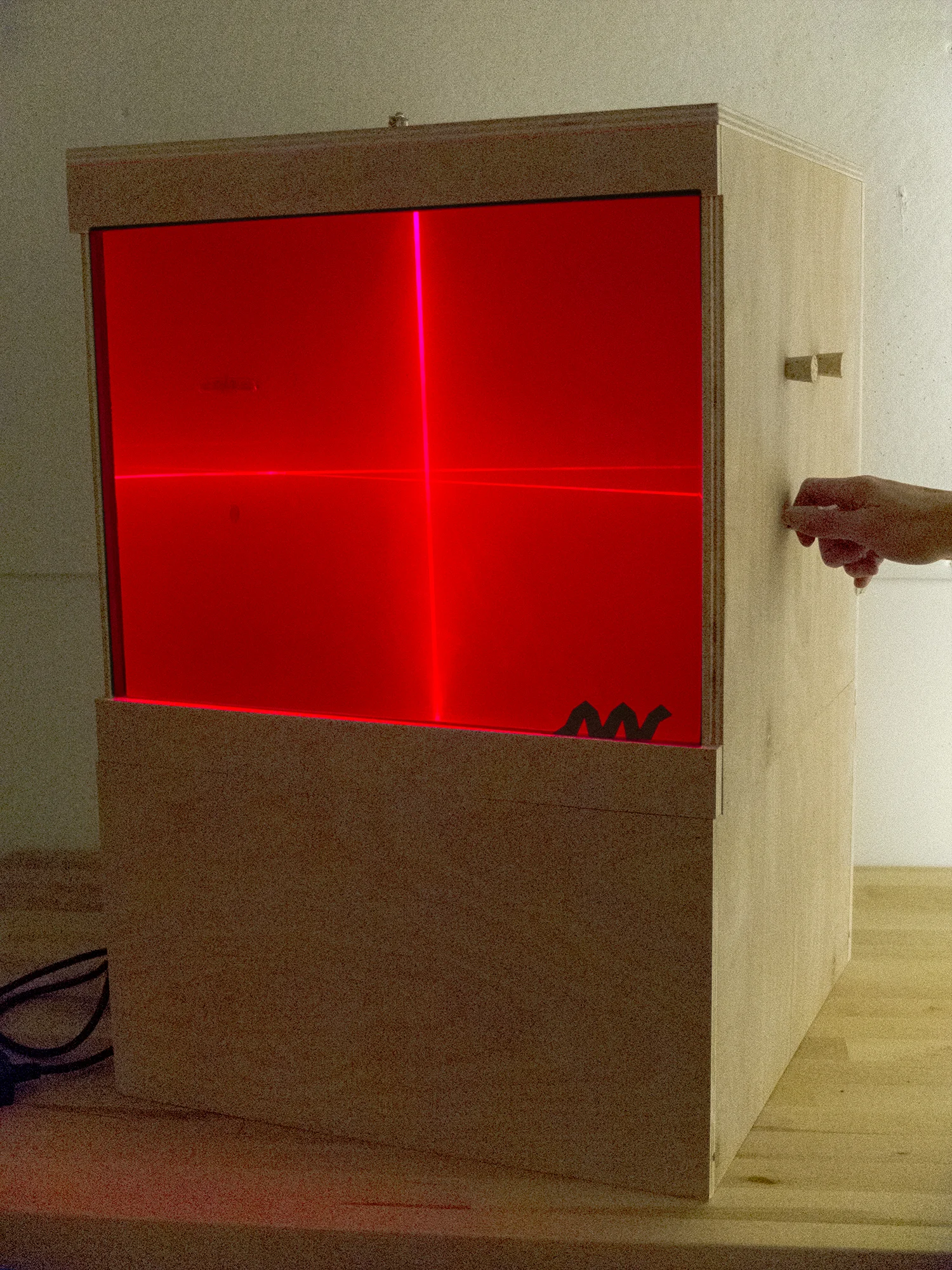 LaserBoxInProgressWithHand.jpg