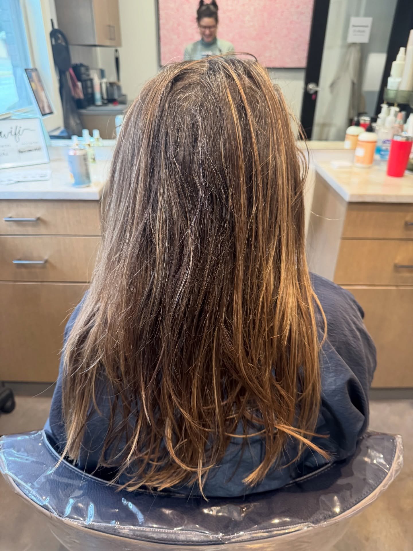Before highlights for grey coverage and magic sleek for smoothing and the after! We did in two sessions and waited two weeks after the magic sleek to apply the highlights to protect the integrity of her hair and keep it healthy! The end result is bea
