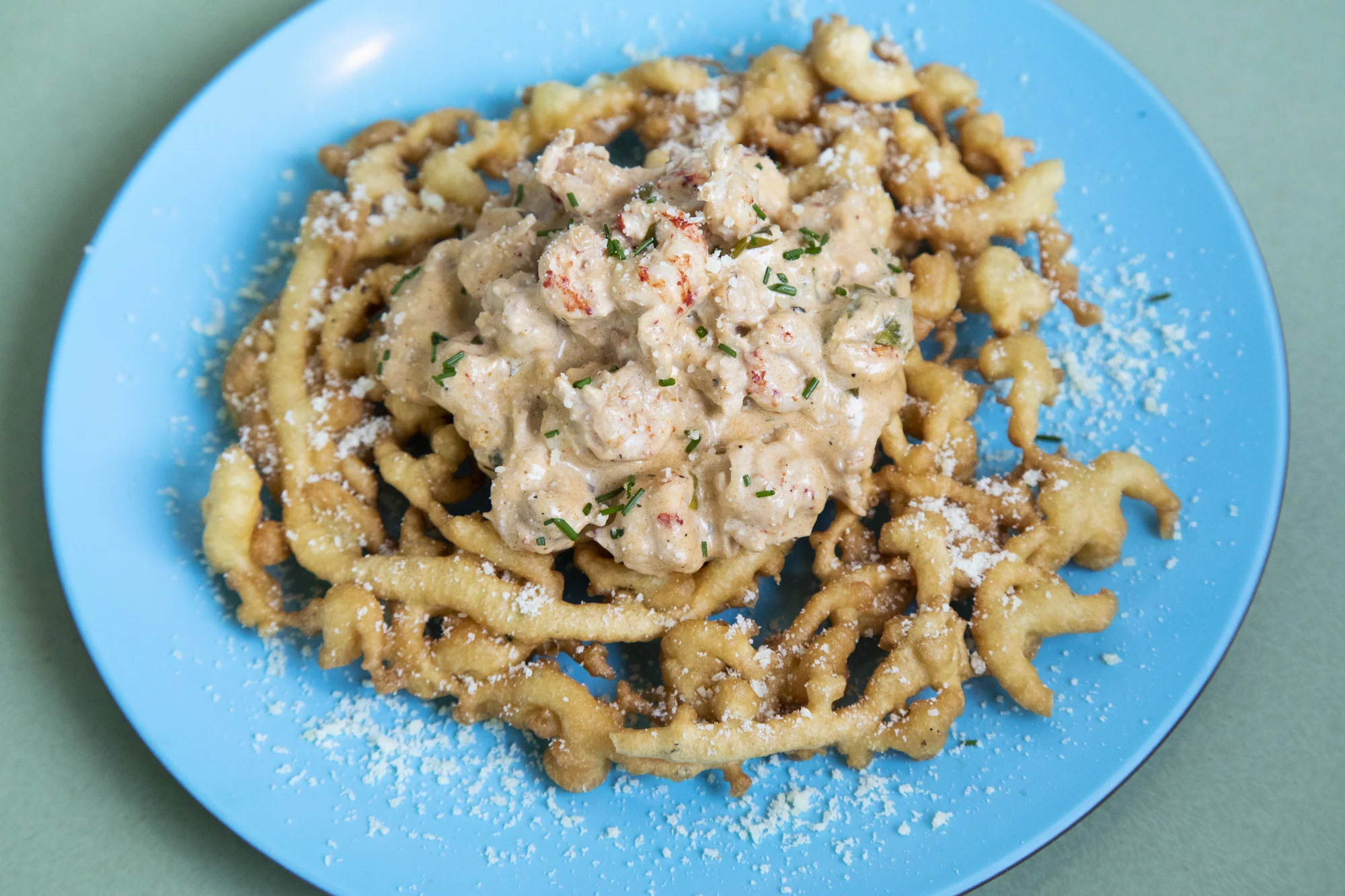 Creamy Crawfish Lafayette on a Savory Funnel Cake / Culture Crushers.