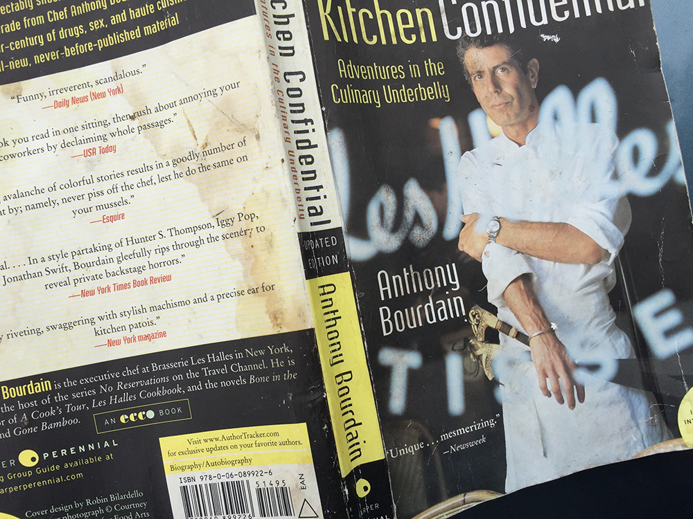 My well worn copy of Kitchen Confidental
