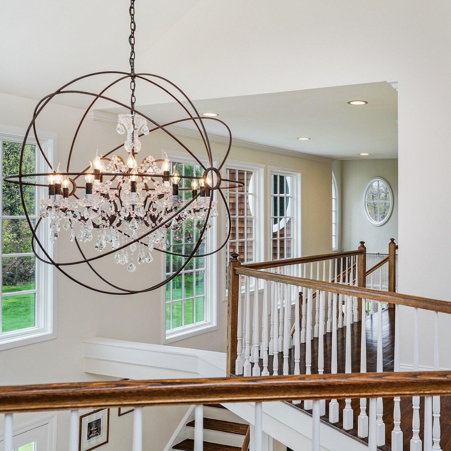 From the majestic chandelier casting a warm glow over the foyer to the grand living room with its rich wooden floors and a cozy fireplace, every corner of this home invites you to relax in style. 

📍 6 Lakeside Drive

Every detail, beautifully captu