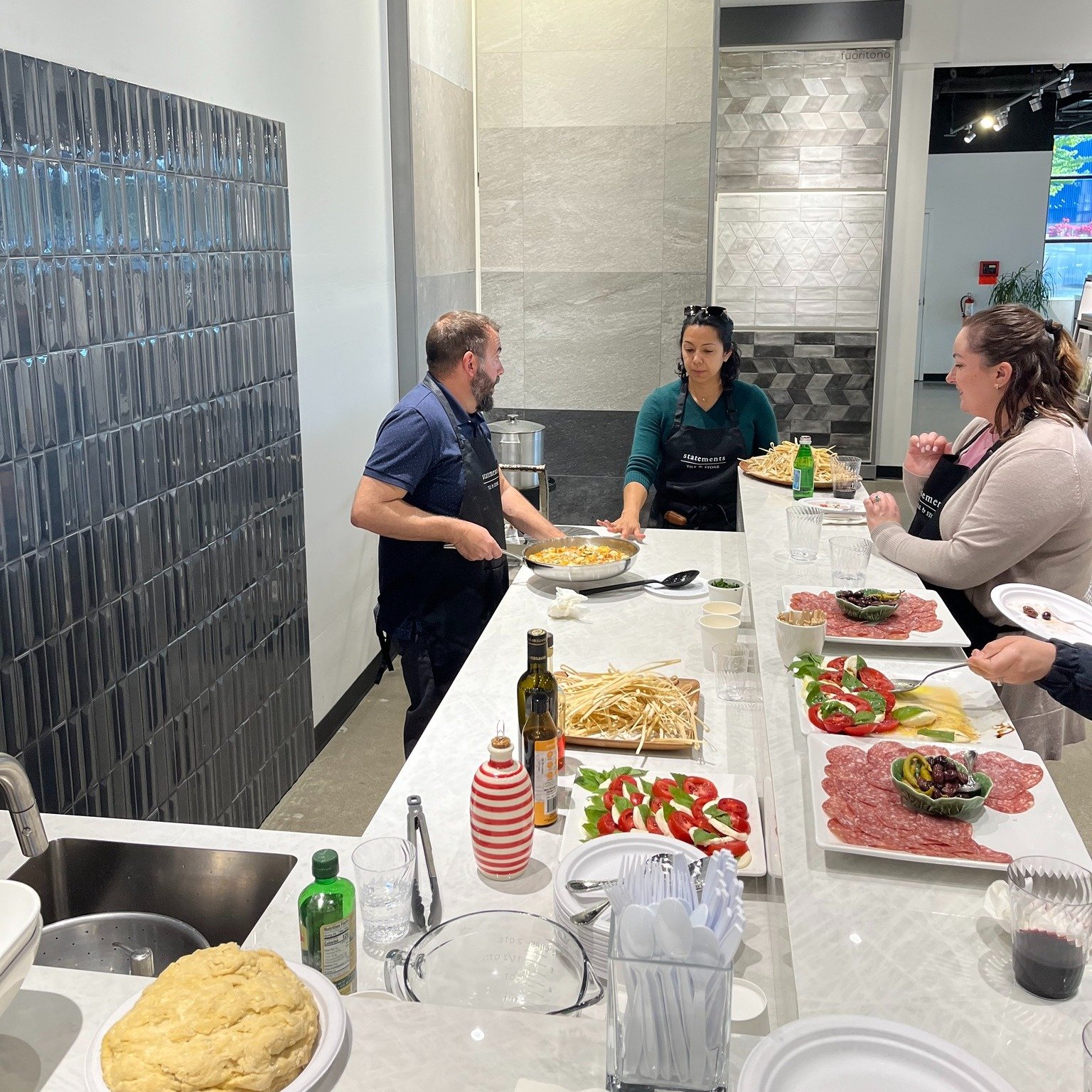 When most of your tile are from Italy, you obviously have to host a pasta event from time to time. We had a blast at our Pasta Making happy hour with the team from @hok_seattle! Making pasta from scratch, rolling out and cutting the noodles, all whil