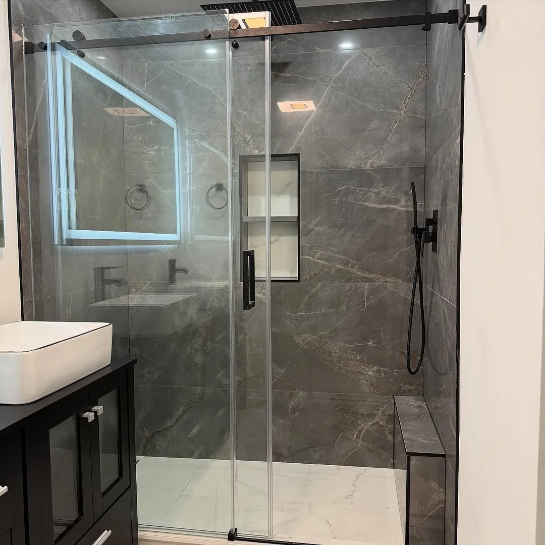 High contrast, high impact.
This bathroom showcases the refined beauty of our Marvel X collection &mdash; a perfect balance of texture, tone, and timeless elegance. 

There&rsquo;s nothing we love more than seeing your visions come to life. 🤍

.
.
.