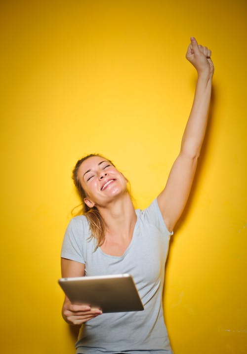happy womanon tablet.jpeg
