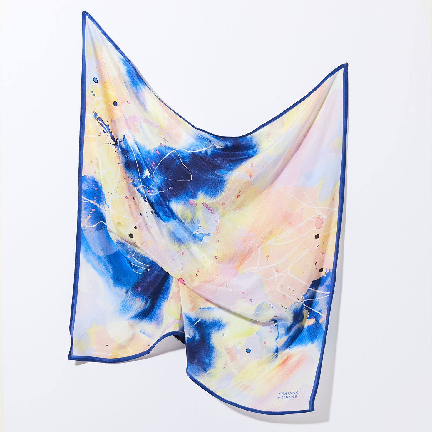 MULTI-COLOURED WOMEN’S SQUARE SILK SCARF WITH AN ABSTRACT PAINTERLY PATTERN AND A BLUE BORDER.