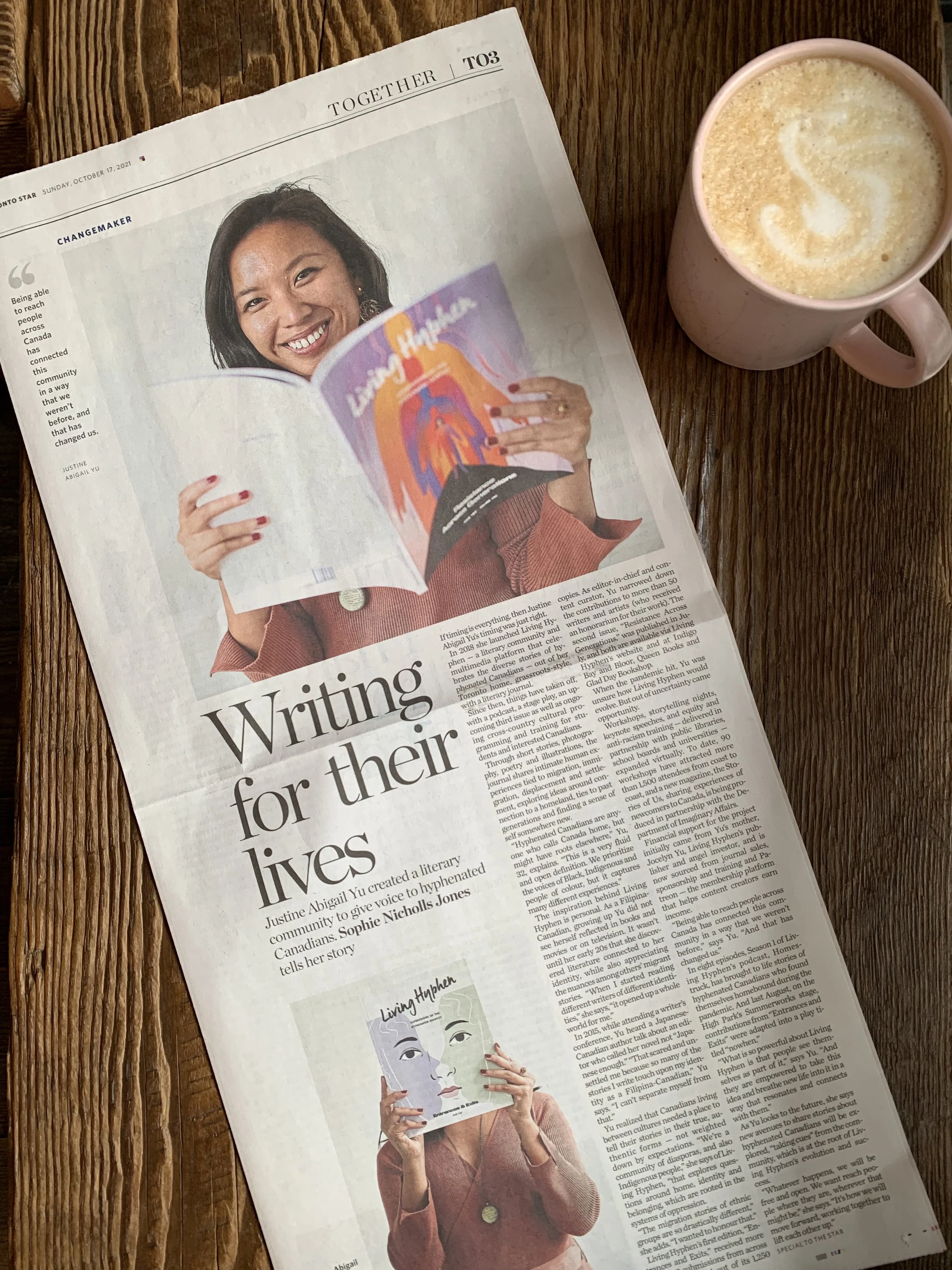 Flat lay of a newspaper featuring Justine and Living Hyphen.