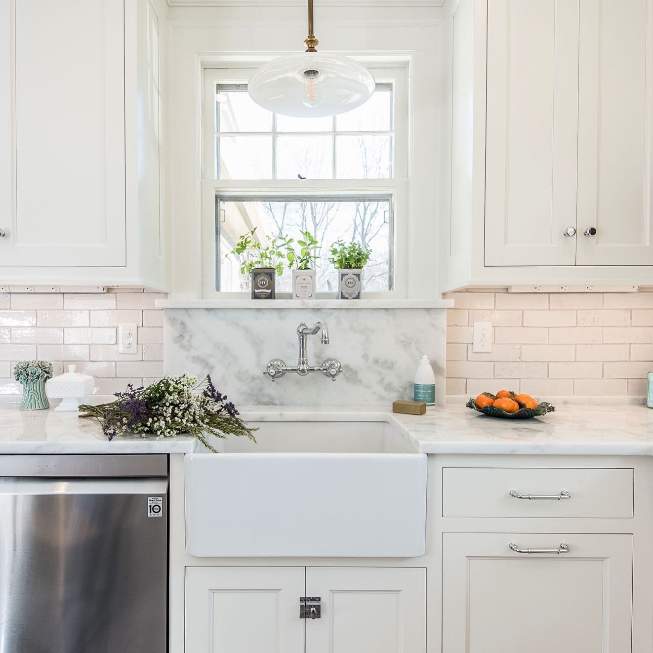 Dressed in winter WHITE! 
Loved working on this historic home leaning into vintage style items like this faucet, brick backsplash, countertops &amp; lighting. 
#covenantkitchens 
Photo 📸@briandavidbecker