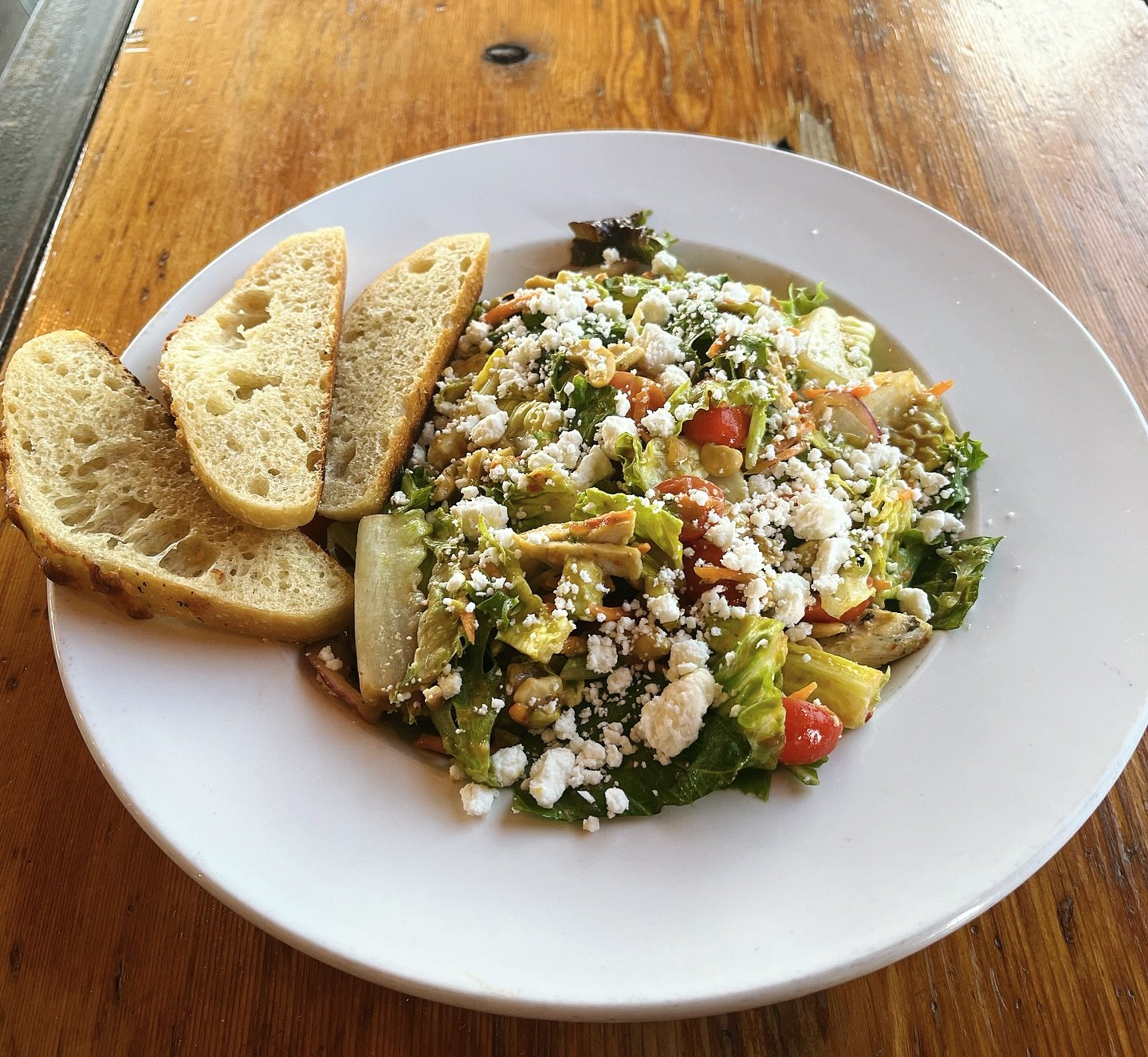 🥗 Last call! Ginger Chicken Salad&mdash;Romaine lettuce, marinated chicken, red onions, cherry tomatoes, carrots, cashews, avocado and feta tossed in a ginger soy dressing, served with our house focaccia bread. Available through Friday.