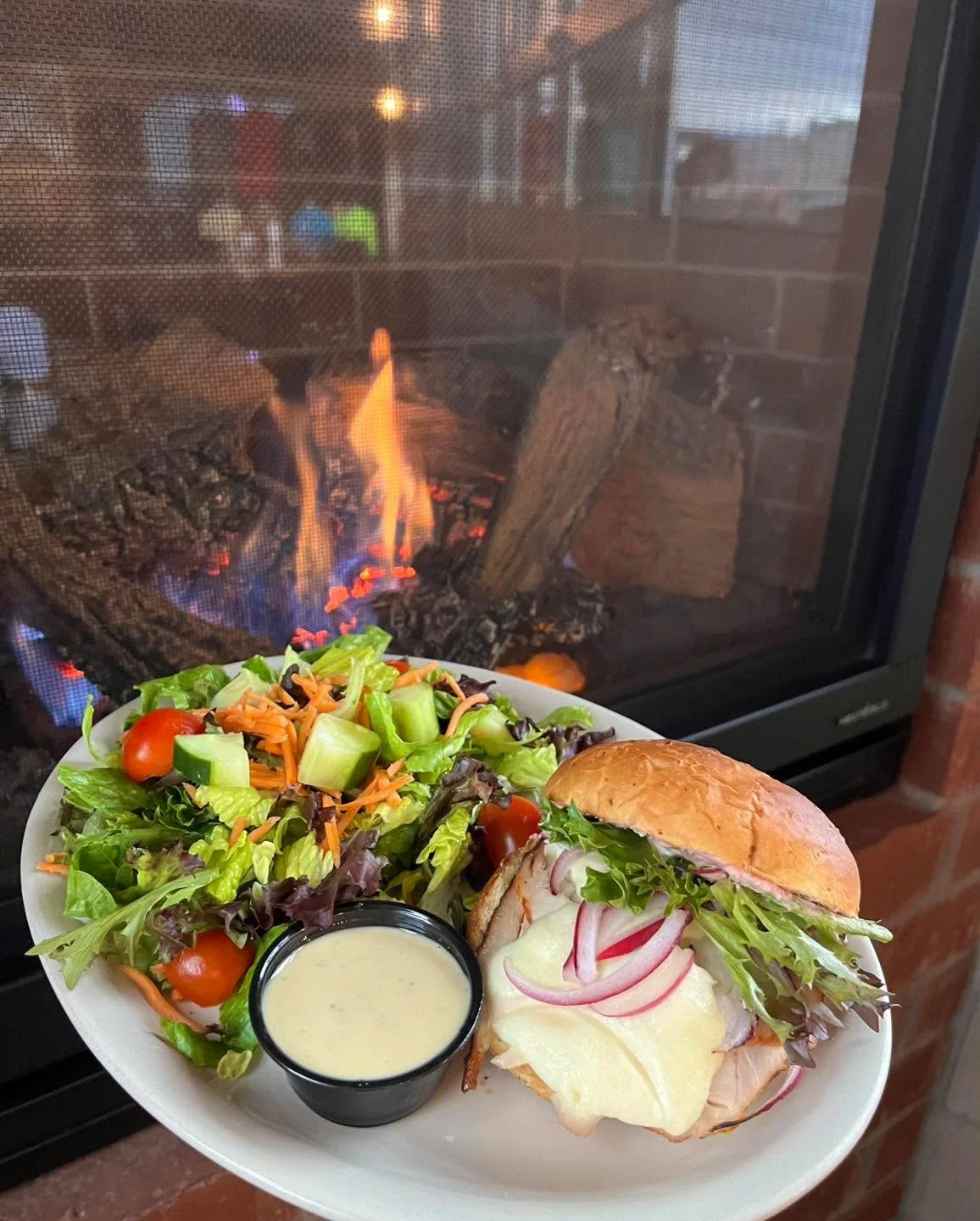 New food special starting today&mdash;introducing The Gobbler 🦃 A smoked turkey sandwich with a spiced cranberry and cream cheese spread, fresh mozzarella, spring mix and red onion, served on a Train Wreck Bakery Garlic Rosemary Bun. Comes with your