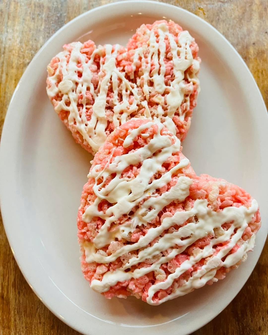 💕 Heart shaped Rice Krispies are here for this heart filled weekend! Sweet, pink, and drizzled with white chocolate. 💞