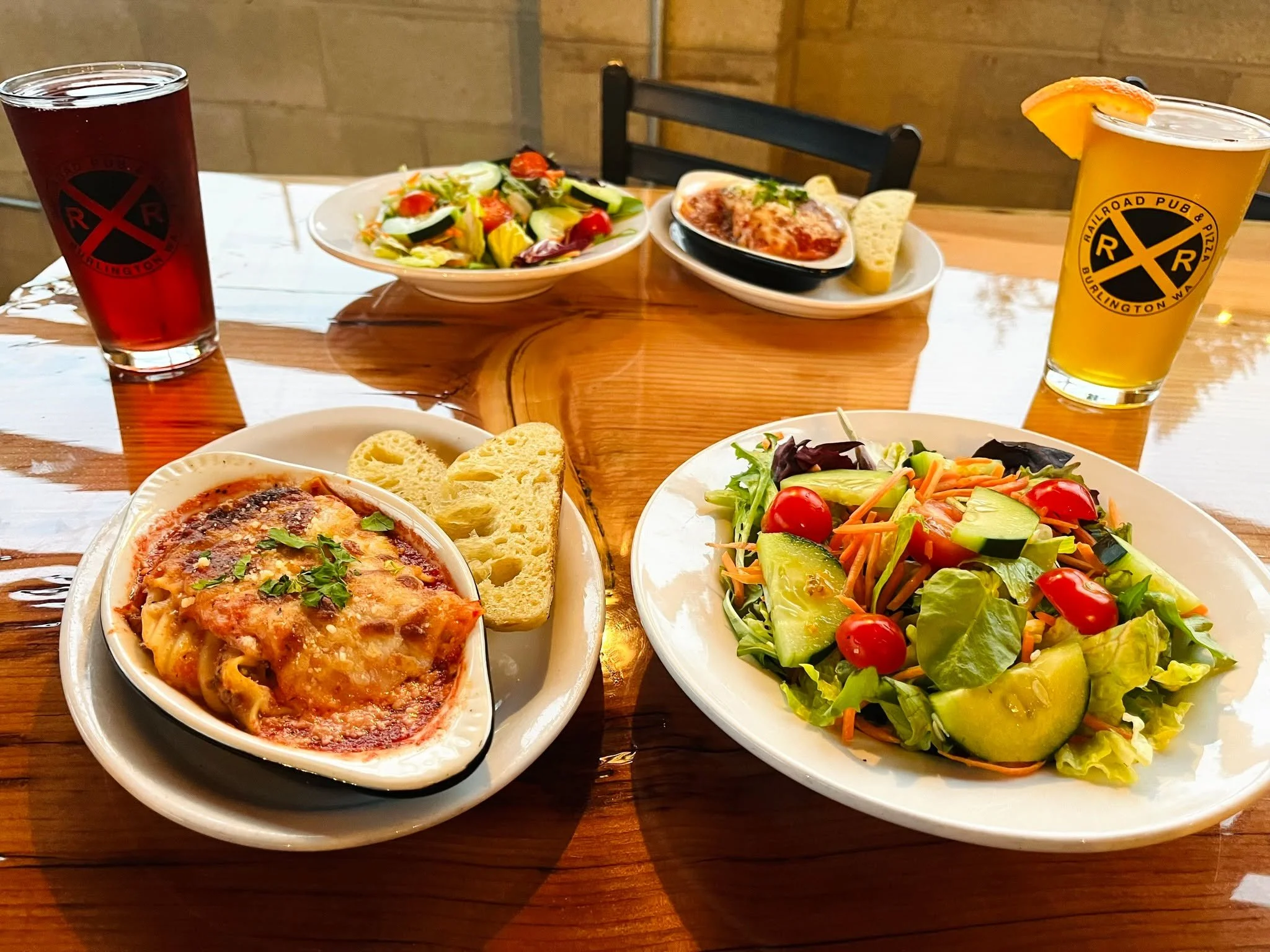 Lasagna for two, we just need you! 💕 Two portions of lasagna made with a house-made meat sauce, creamy ricotta, melted mozzarella, parmesan &amp; herbs. Served with your choice of a house or caesar salad.