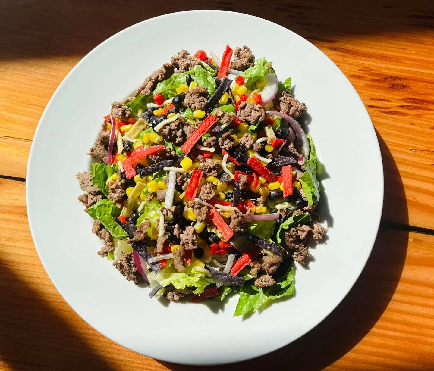 🆕 Southwest Steak Salad&mdash;Savory steak, romaine lettuce, roasted red peppers, corn, black beans, crispy tortilla strips and chipotle ranch on the side, $20.