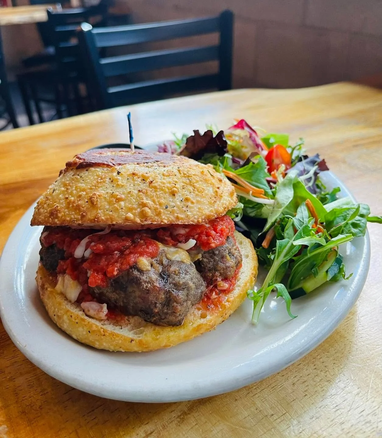 Our meatball sandwich is on special at Railroad! Jack Mountain hamburger &amp; hot Italian sausage, a special blend of herbs and spices with house made marinara, mozzarella and shaved parmesan&mdash;served on our house made focaccia bread. Comes with