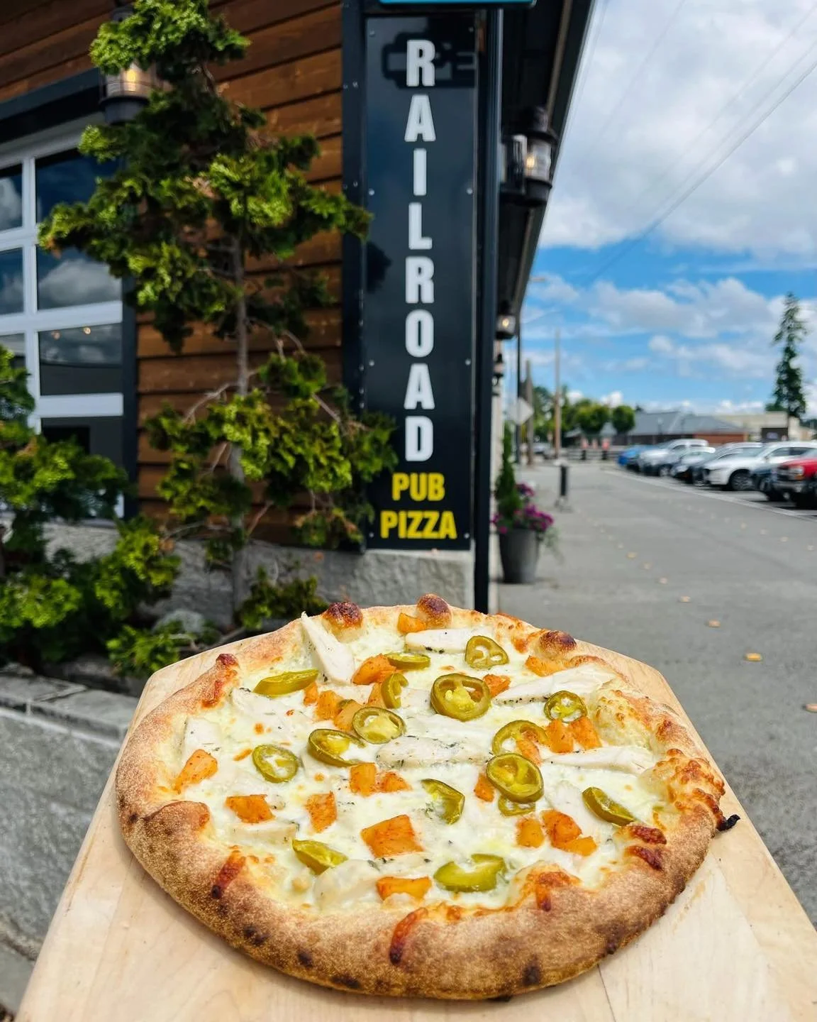 LAST CALL! 📣 HWY 20 Hawaiian&mdash;Our house made ranch, shredded mozzarella, and chicken topped with pineapples and jalape&ntilde;os.