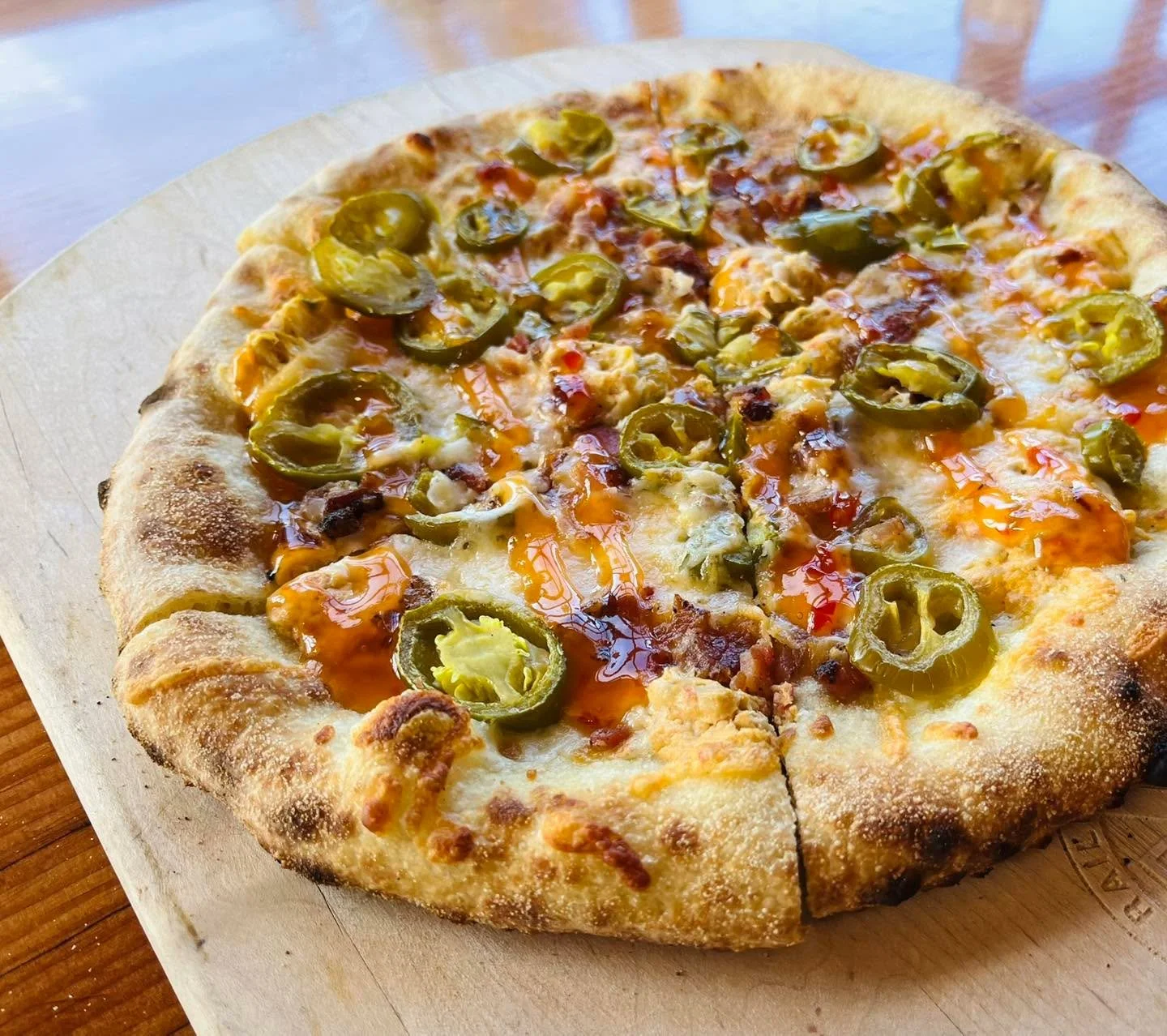 Ready for a new pizza special?! Try our Jalape&ntilde;o Popper Pizza, available for a couple of weeks! Railroad&rsquo;s own jalape&ntilde;o artichoke dip with cheddar and mozzarella cheese, Hempler&rsquo;s peppered bacon, and jalape&ntilde;os. Finish