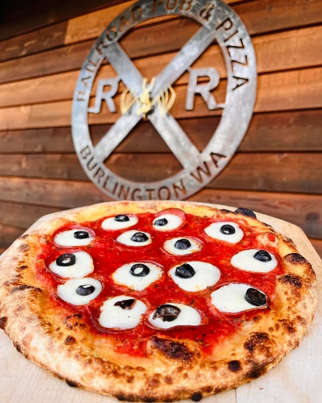 Eye spy a spooky twist on a classic pie! 👀 Pepperoni and black olive eyeball pizza&hellip;This special is only available on Saturday for our 10th Annual Halloween Costume Party from 6-9PM right here at Railroad Pub &amp; Pizza. 🍕
