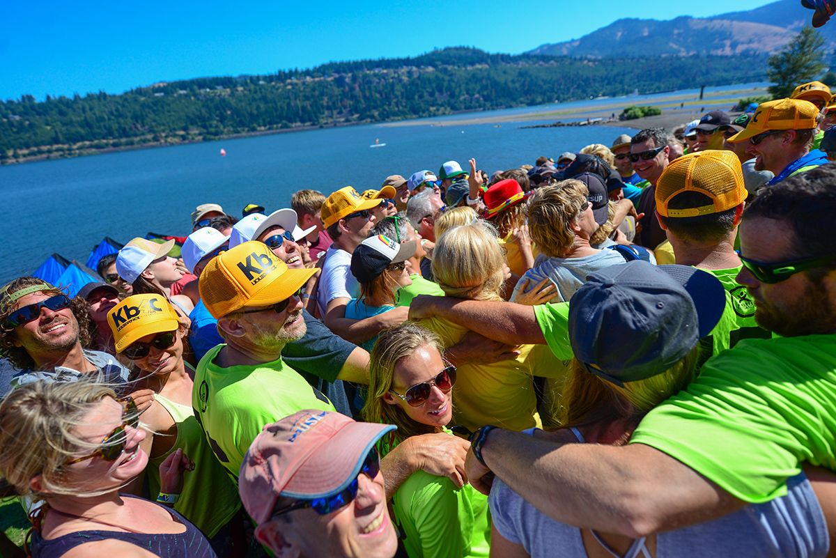 Group hug amongst athletes in 2015