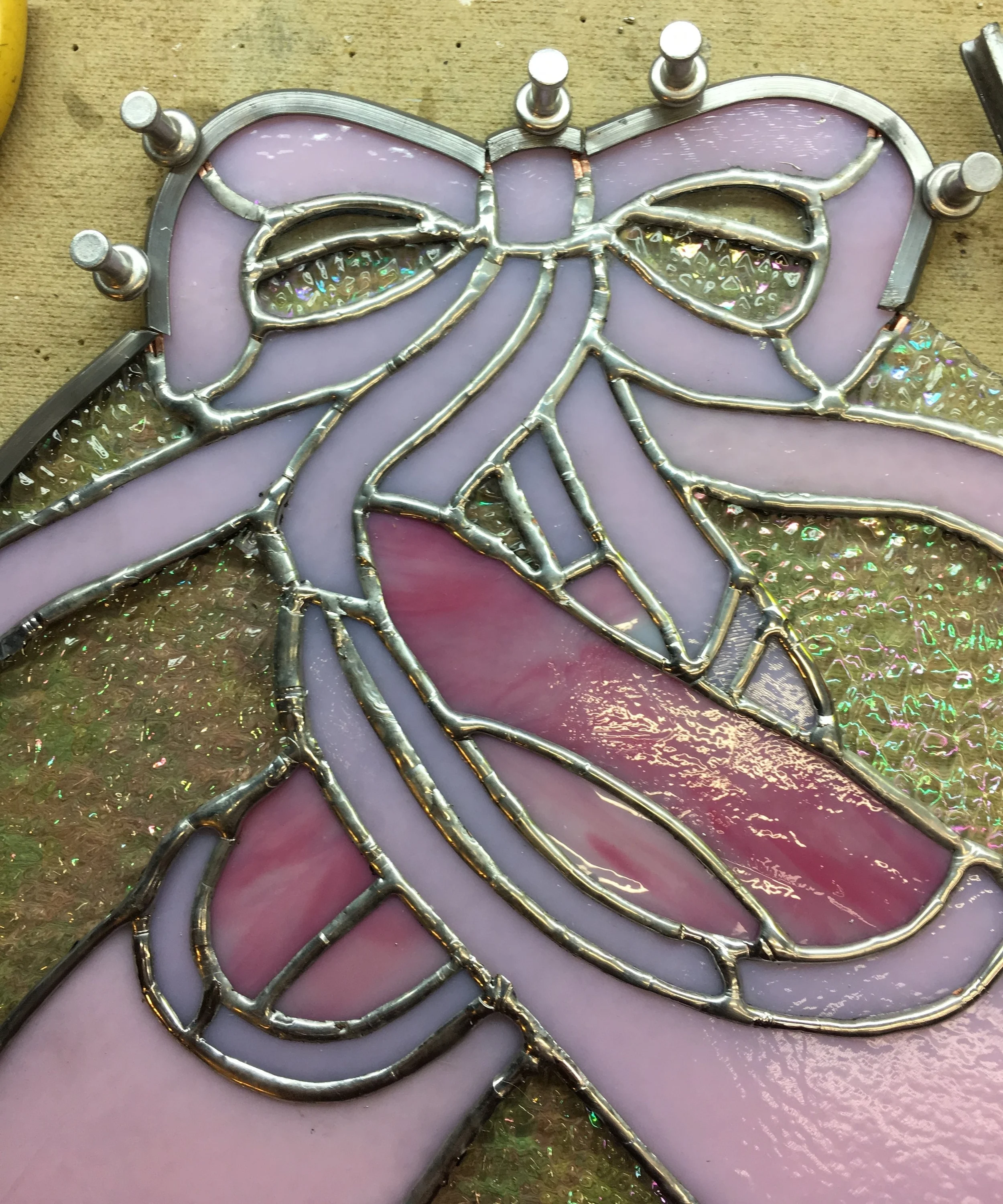 Here's a section of the ballet slipper panel I'm working on for my coworker - I don't want to share a whole picture until she receives it!