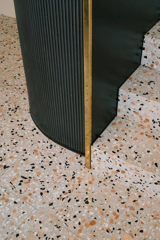 Terrazzo flooring is EVERYTHING to me right now! I am OBSESSED with this throwback flooring option for a Midcentury home or even a bohemian bungalow with a mix of different interior styles. There are tons of benefits to this type of floor. It's long lasting, durable, non-porous ( so no dirt can accumulate), and it looks sooo cool!