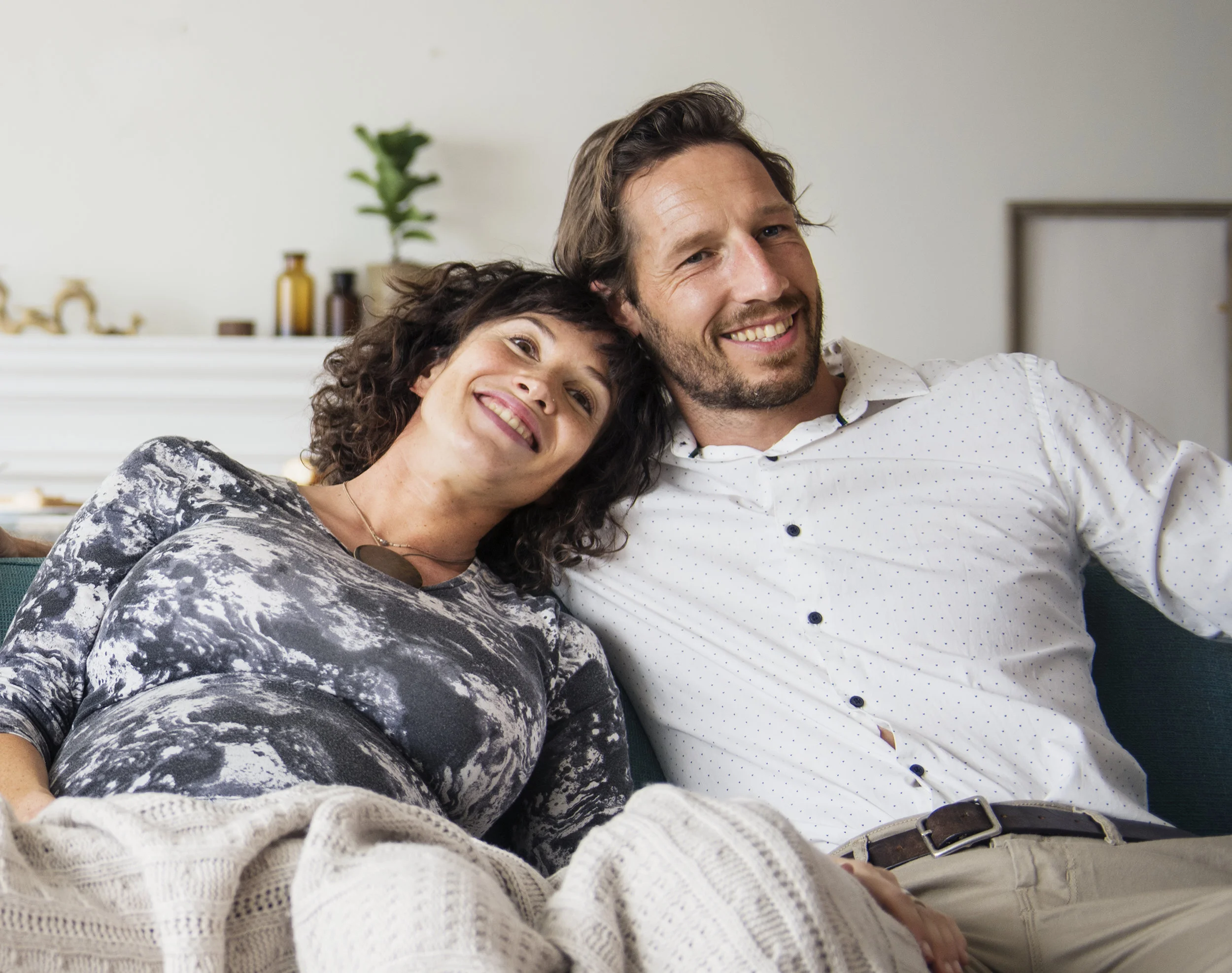 Couple relaxing in a living room