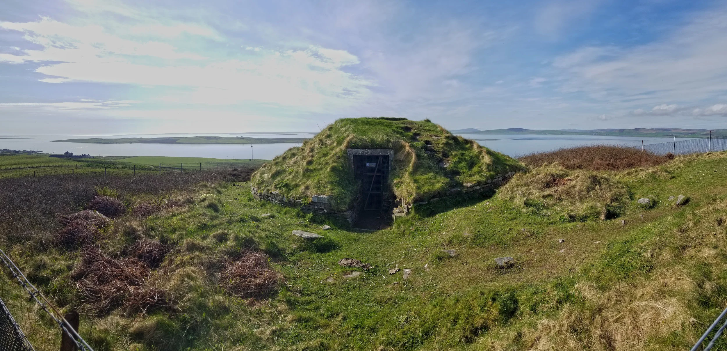 The 3,000-year-old chambered cairn of Taversoe Tuick on Rousay overlooks the island of Wyre and the surrounding Wyre Sound.