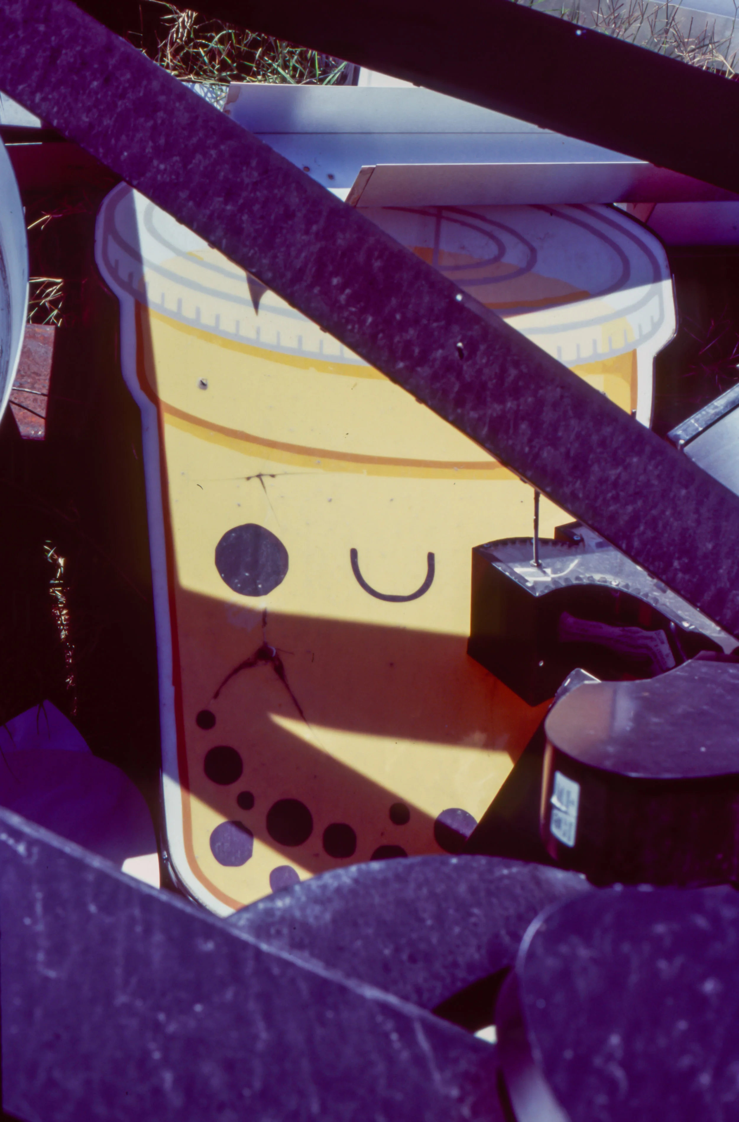 Boba behind bars. At Cook & Company Signmakers (Fuji Velvia 100)