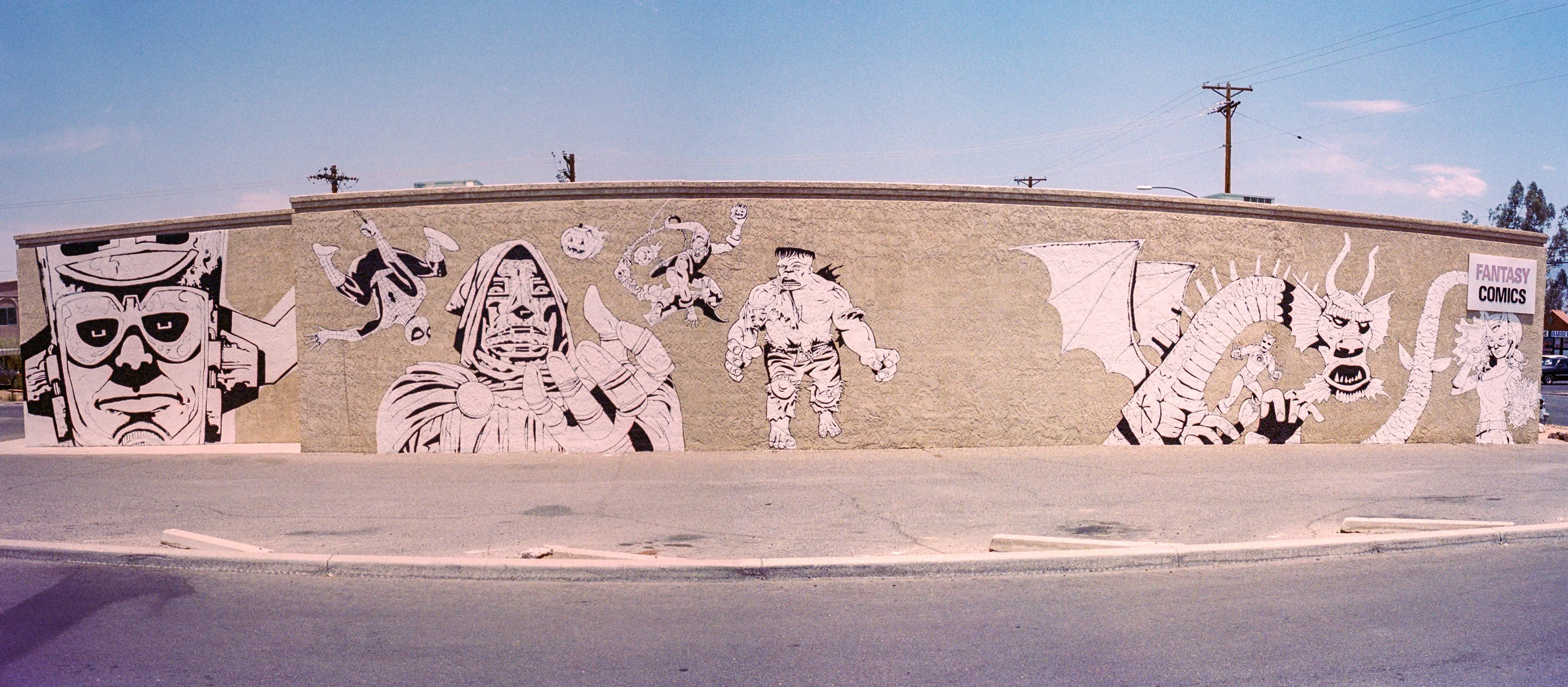 In-progress Marvel Super Hero/Villain mural at Fantasy Comics, Tucson, AZ by Danny Martin (Kodak Hawkeye Traffic Surveilance Film 2468)