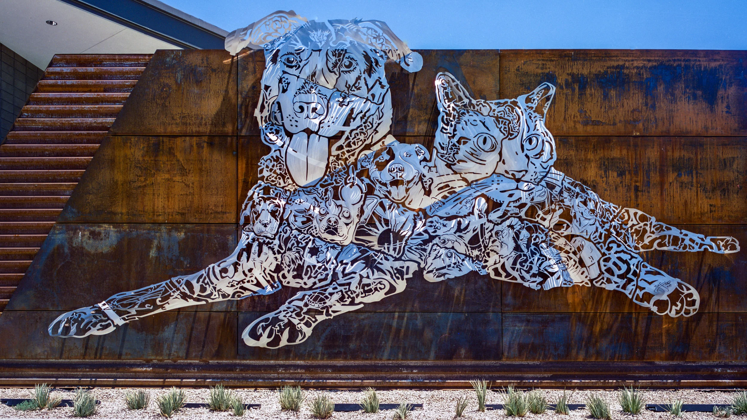 Animals in stainless steel. Sculpture by Roger Stoller/Stoller Studio @ Pima Animal Care Center, Tucson, AZ (Cinestill 50D)