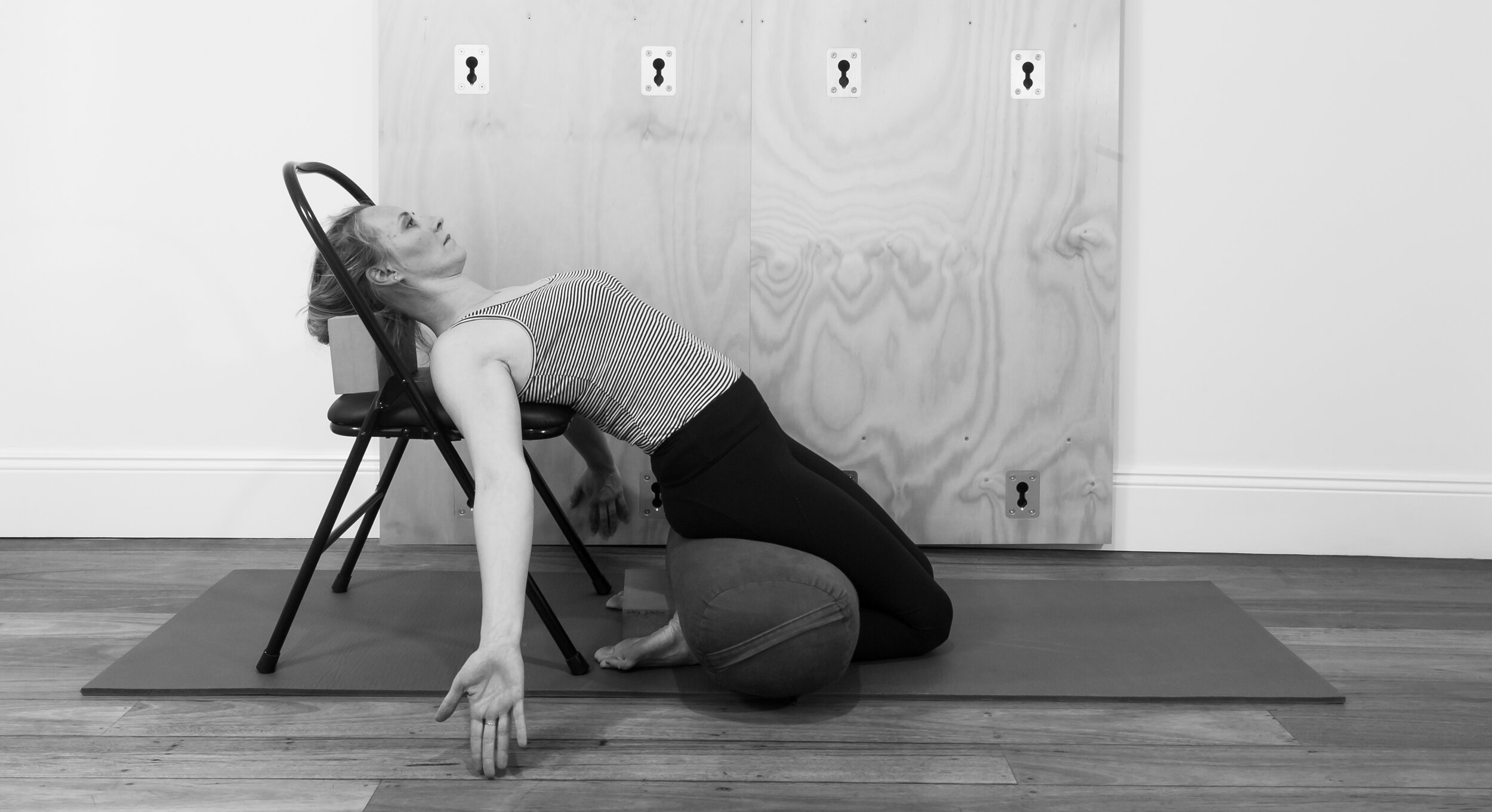  Variation using bolster behind knees and chair for spinal support 