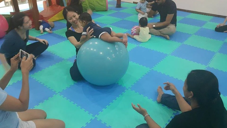 Daisy with her students at Trinity Kids