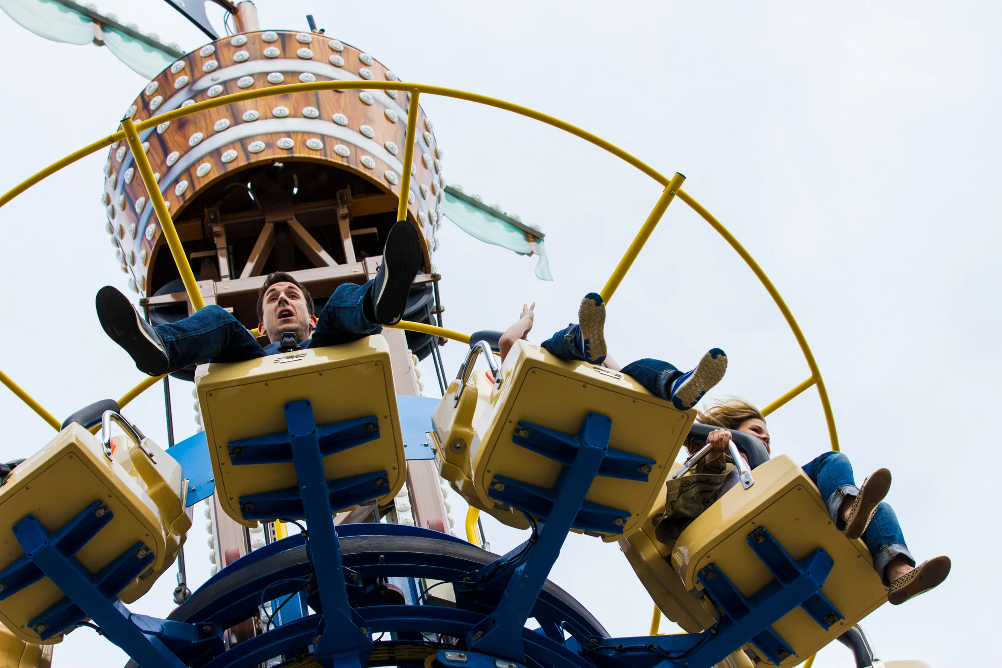 Man is surprised while riding a carnival ride