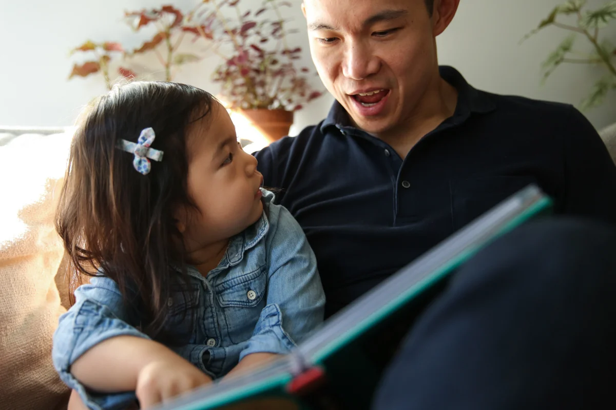 Man reads story to child