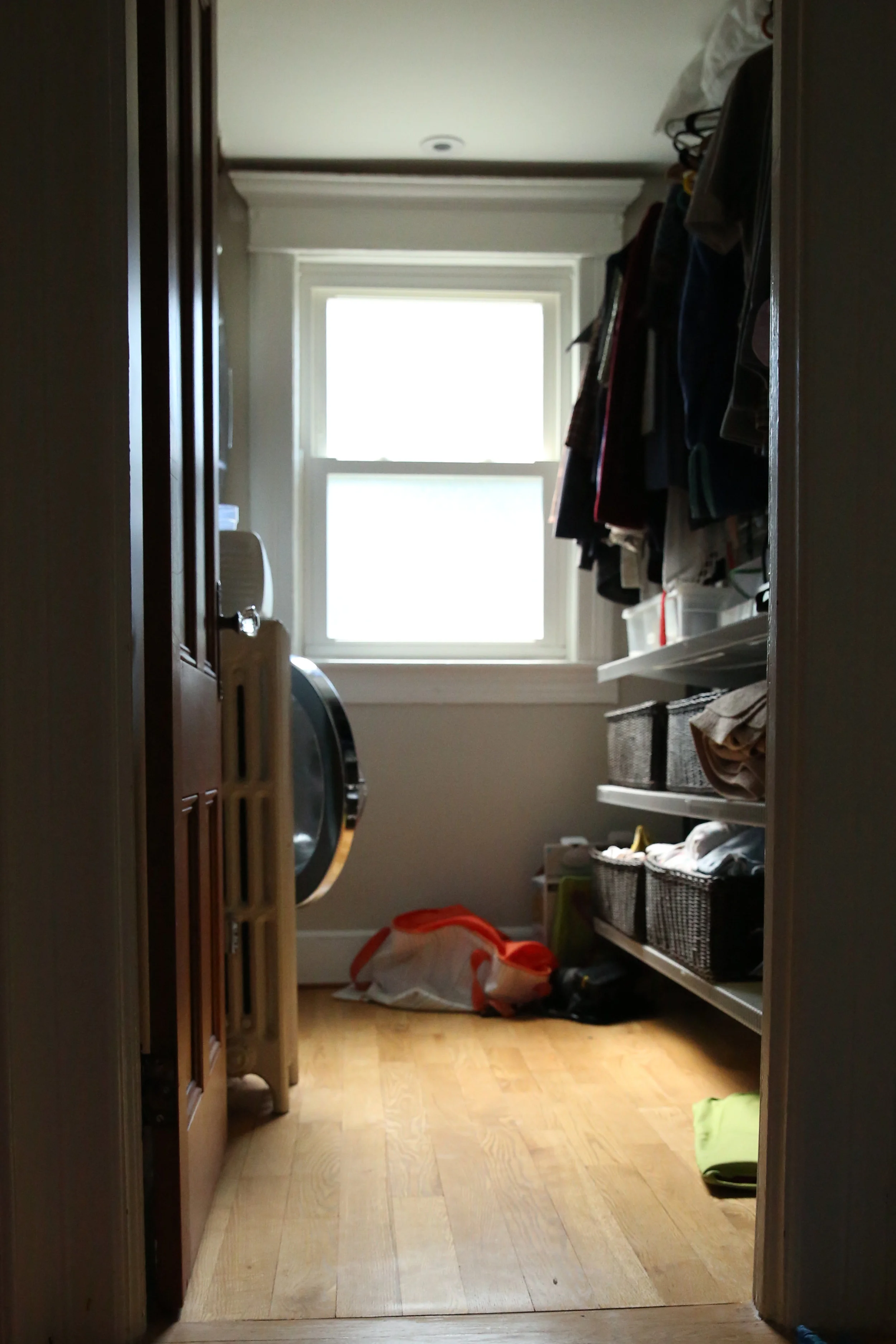 Our little laundry room closet. Just image a frantic Asian women kneeling on the floor with mounds of bedding and bath towels.