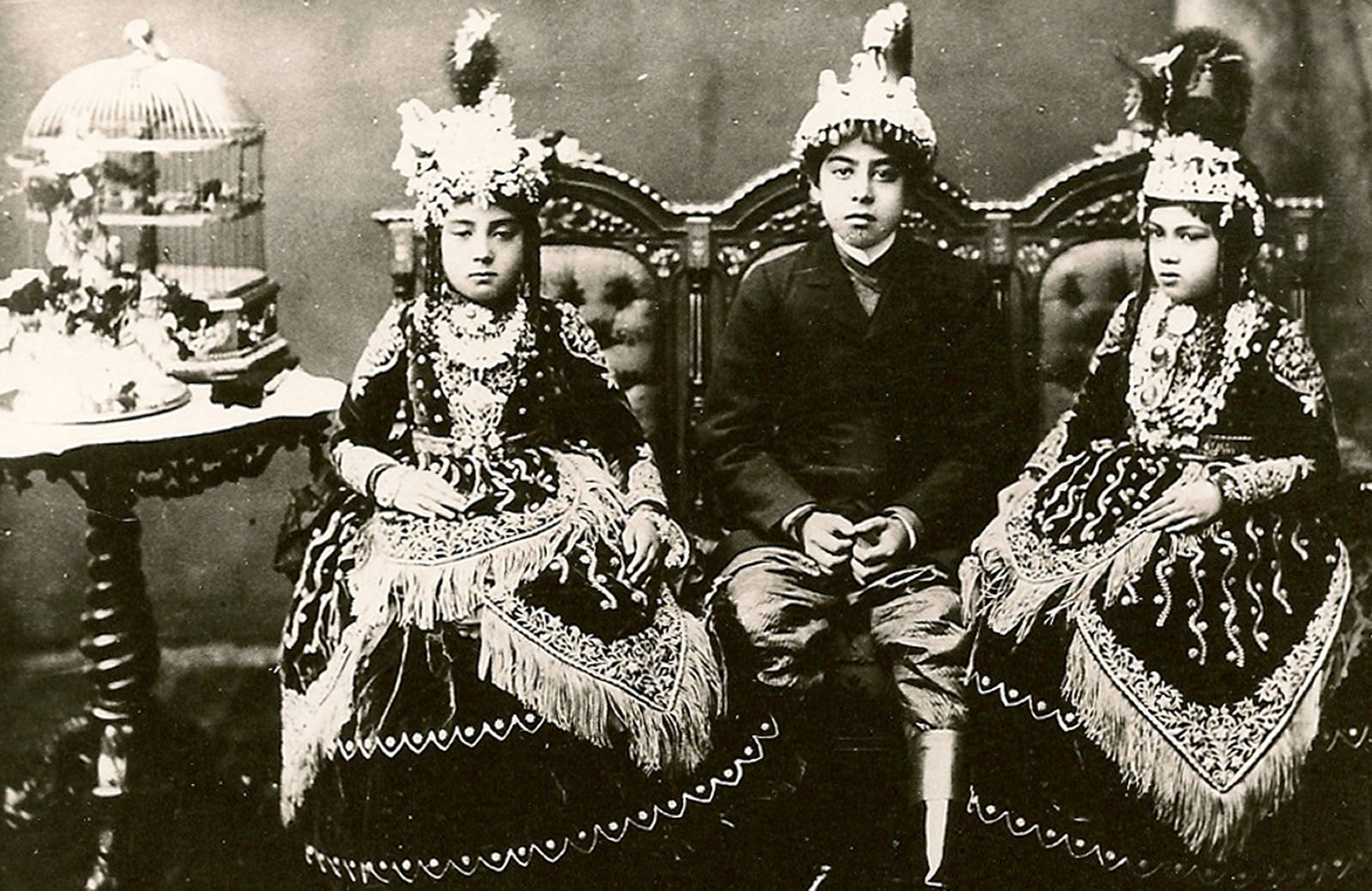 King Prithvi Bir with his third and fourth queens, c1895.