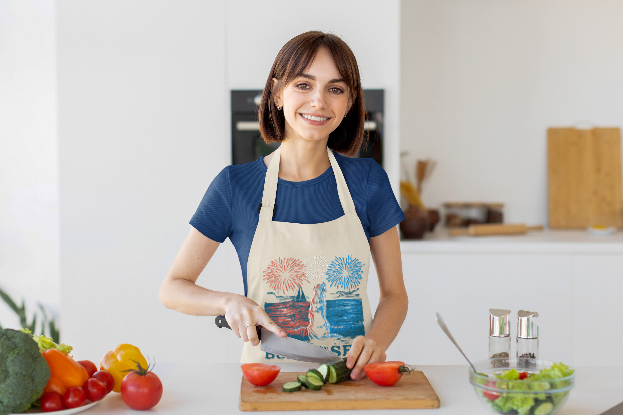 embroidered-apron-mockup-of-a-smiling-woman-cutting-vegetables-m32145-r-el2.png