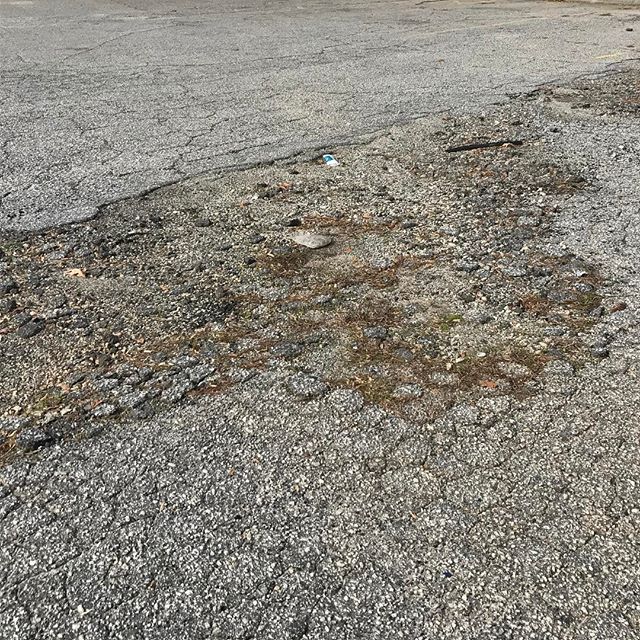 This is a fully failed area &amp; needs to be cut &amp; cleared from the sub-grade in order to be patched properly. The goal is to seal your cracks before it ever gets to this point.