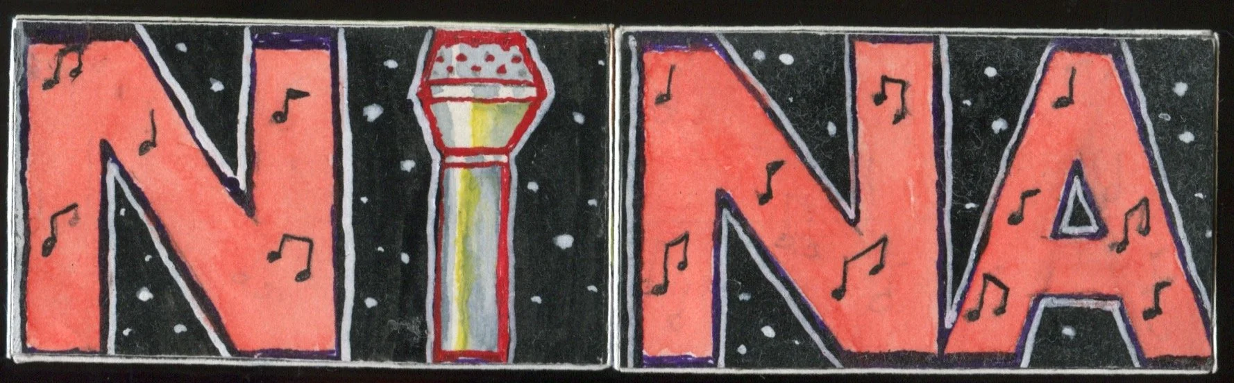 nina blocks microphone.jpeg