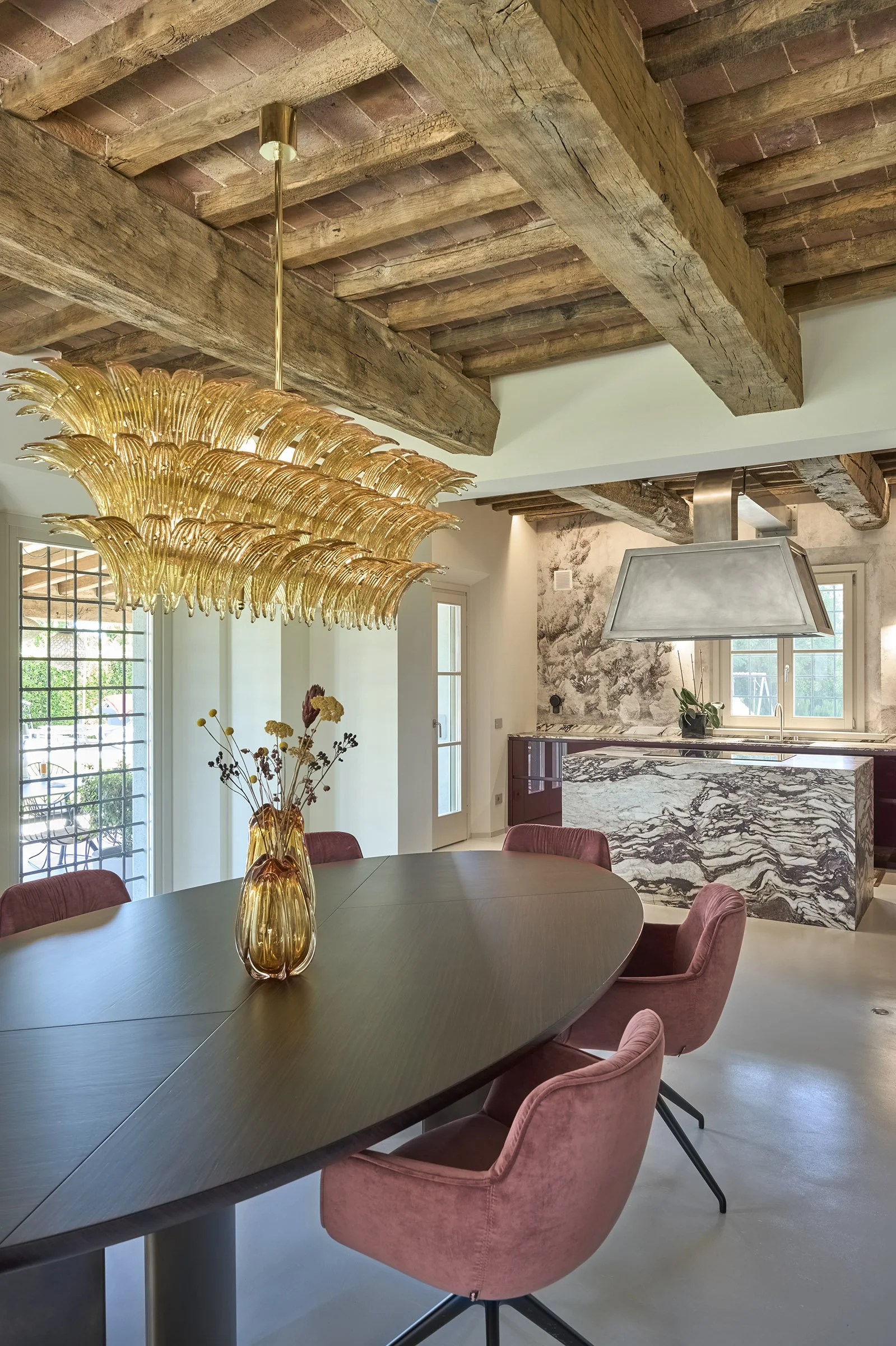 Luxury Tuscan villa dining featuring sophisticated furnishings and elegant interior design