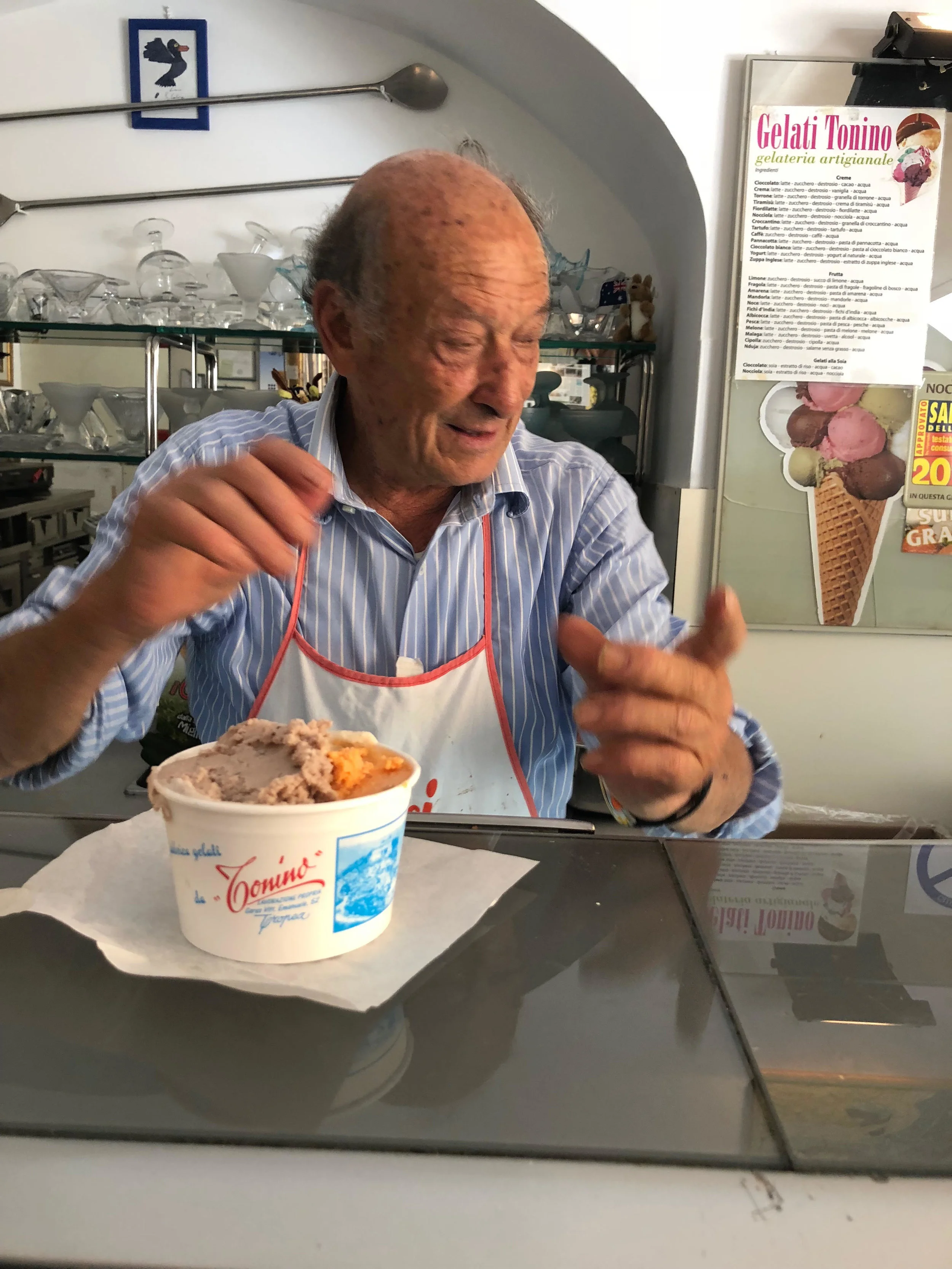 Tonino himself serving us the most unique flavors of ice cream, including olive (left) and spicy salami (right) in Tropea, Calabria.