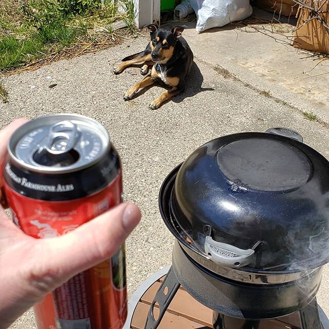 A dog, a beer, a grill. The holy trinity.