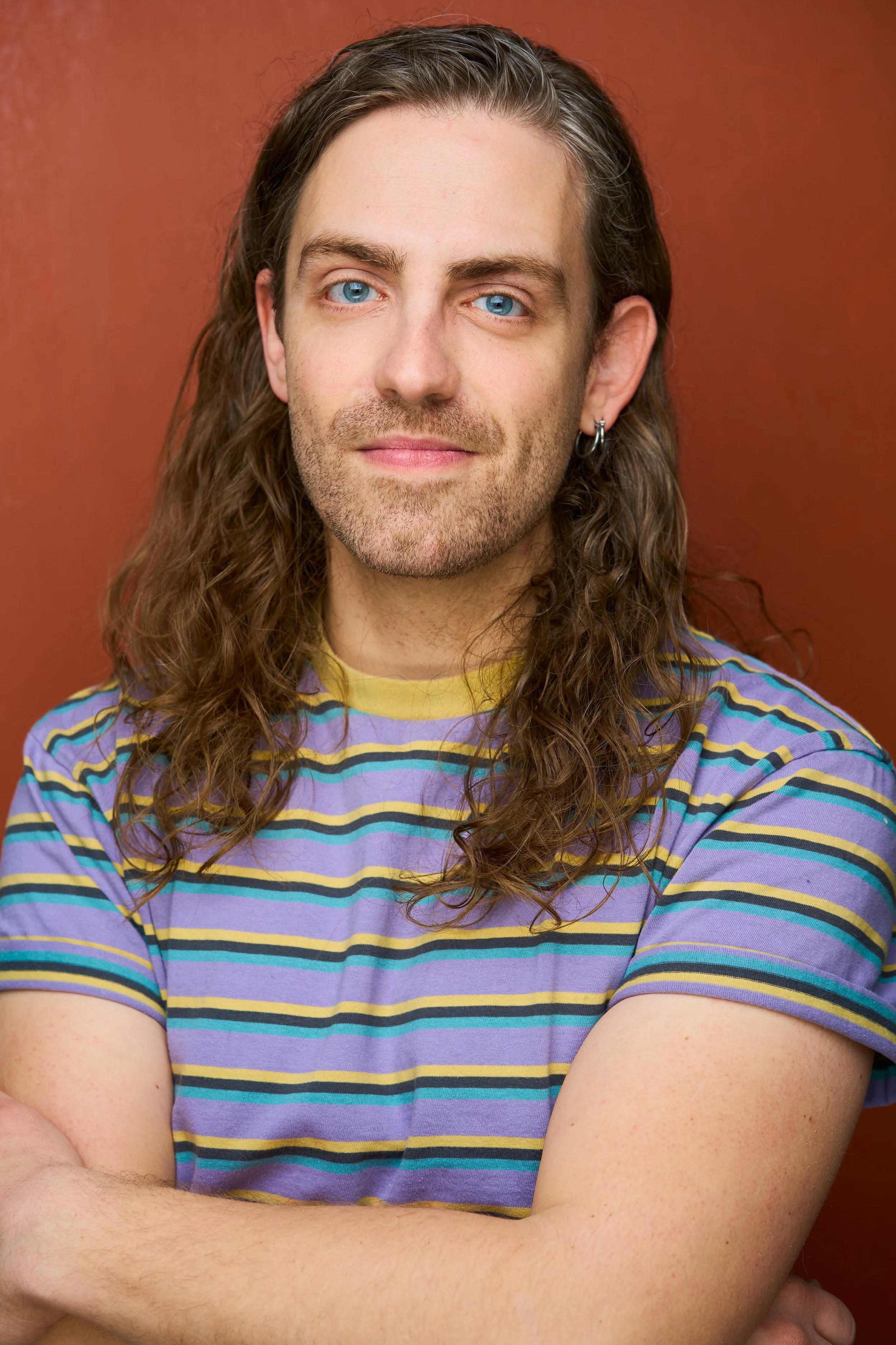 Trevor Bunce Headshot Earring (1).jpg
