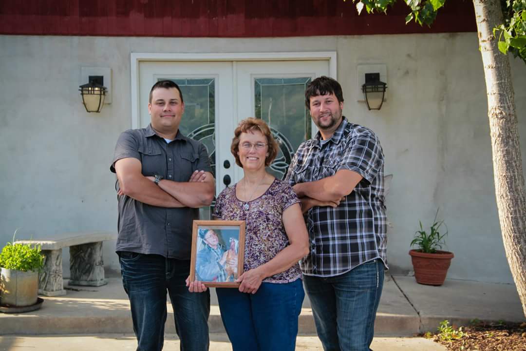 Lynn and her two boys, who are huge part of the farm.