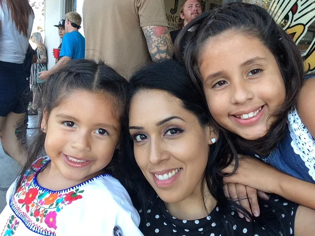 Liz and her two daughters. 