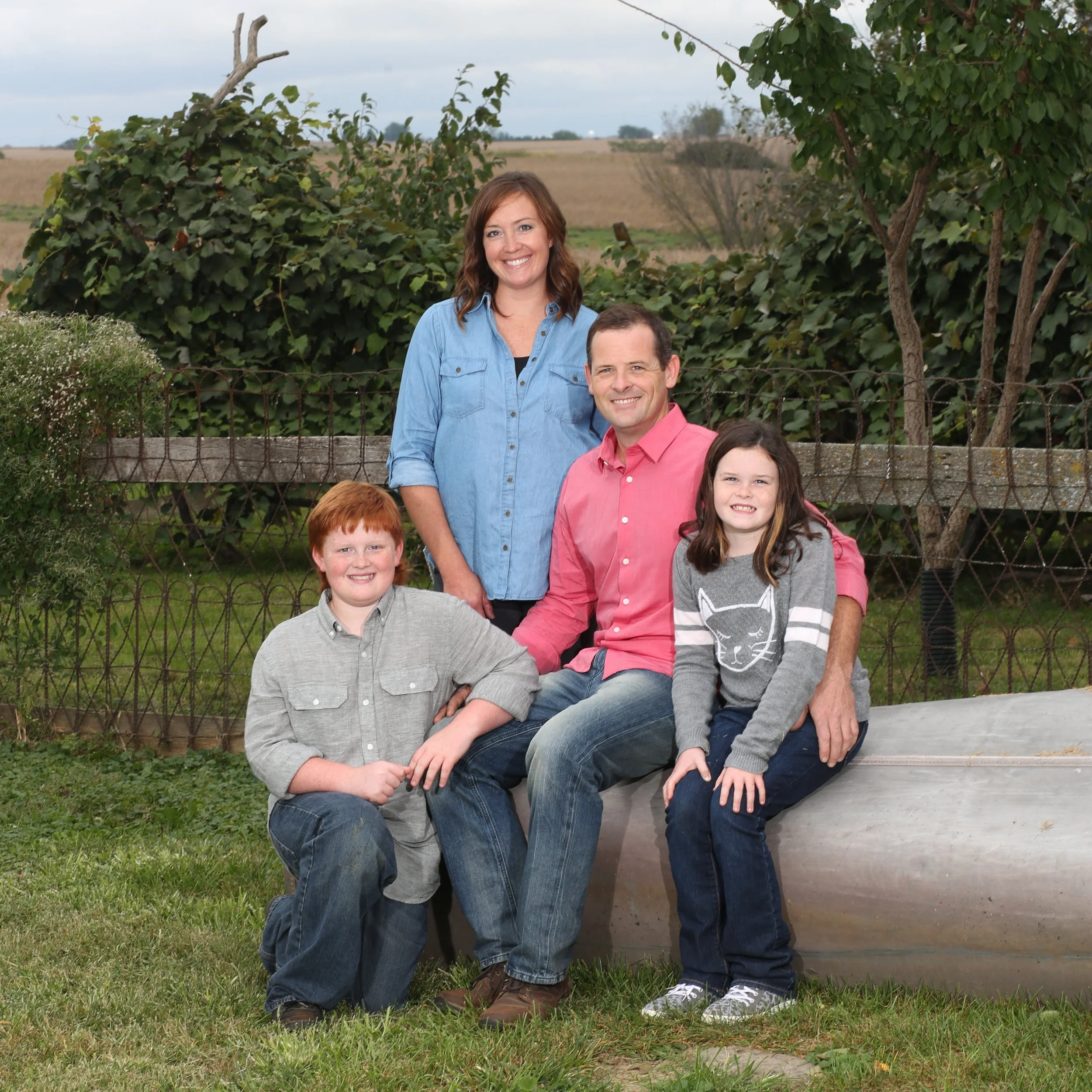 Brenna with her husband, Rogan, and two children, Bo and Mae.