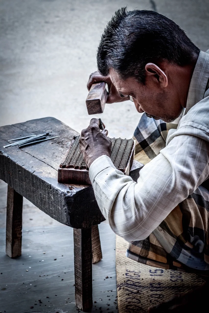 An artisan blocking printing in the studio. Image by Himanshu Khandelwal