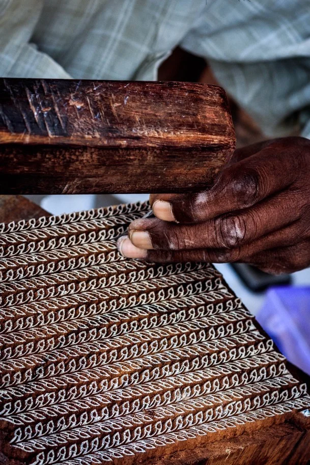 An artisan woodcarving for block printing for Baby Pepper's. Image by Himanshu Khandelwal