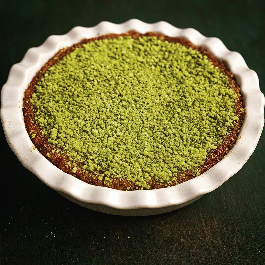 I challenged myself the other day, to make a dessert using only ingredients I had in my workshop at the time. I came up with this Pistachio Silk Pie. Scented with Orange Blossom Water, Cardamom and the barest hint of Anise, this decadent pie might be