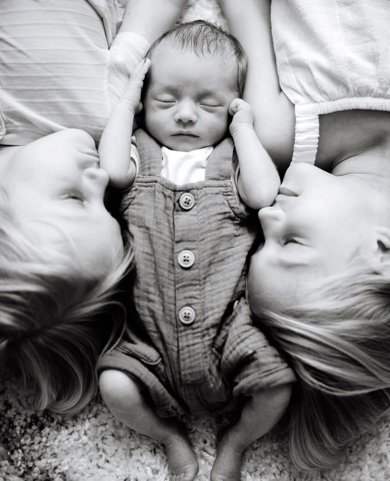 One day, this baby won&rsquo;t remember just how tiny they were, but their siblings will. They&rsquo;ll remember waiting to meet them, holding them for the first time, whispering secrets into little ears. Newborn photography isn&rsquo;t just for pare