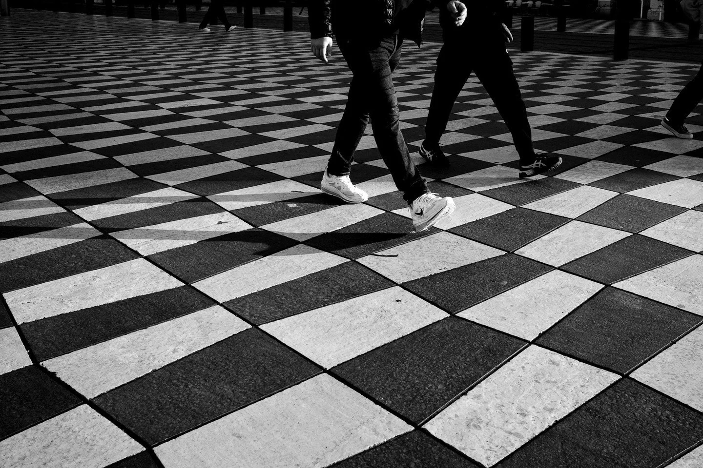 LIFE ON THE CHECKERBOARD | PLACE MASS&Eacute;NA, NICE⁠
⁠
If you're a street photographer visiting Nice, you're going to want to spend some time in Place Mass&eacute;na.⁠
⁠
The enormous checkerboard pavement is practically begging to be photographed. 