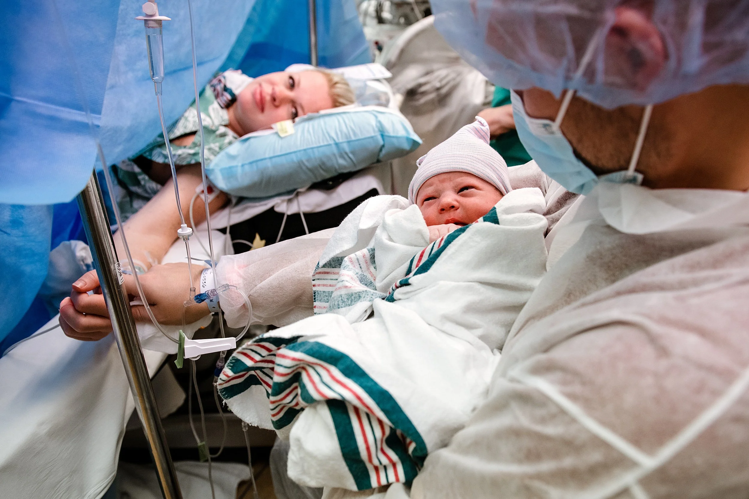 Parents meeting their newborn in the labor and delivery room of a pensacola hospital